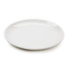 A Tuxton Healthcare eggshell china plate on a white background.