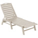 A white POLYWOOD Nautical chaise lounge chair with slats.