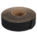 A roll of black tape with a brown band.