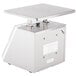 An Edlund Four Star portion scale with a square metal platform.