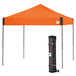 An orange E-Z Up canopy with a bag on top.