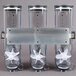 A Zevro SmartSpace wall mount with three clear canisters.