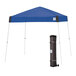 A royal blue E-Z Up canopy with a white frame in a black bag.