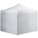 A white tent with a white top and metal legs.