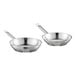 Two silver Vigor stainless steel frying pans with handles.