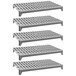 A set of five grey plastic shelves with vented grates.