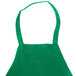 A Chef Revival Kelly Green poly-cotton apron with a front pocket.