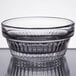 A close-up of a Libbey Winchester glass ramekin with a rim.