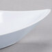 A close up of a GET San Michele White Bowl with a curved edge.