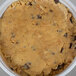 A white bowl of David's Cookies Gourmet Chocolate Chunk edible cookie dough with chocolate chips.