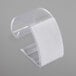 A clear plastic Snap Drape table skirt clip with a white hook and loop tape.