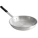 A Choice aluminum fry pan with a black silicone handle.