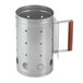 A silver metal Outset charcoal chimney starter with a wooden handle.