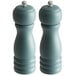 Two Acopa steel blue wooden salt and pepper mills with silver caps.