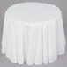 A white table with a white Bunn coffee filter on it.