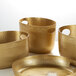 Three gold hammered aluminum beverage tubs with handles.