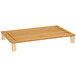 A GET Enterprises bamboo cutting board with legs.
