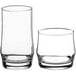 Two Acopa Saloon Rocks glasses on a white background.