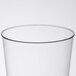 A close up of a Fineline tall clear plastic tumbler.
