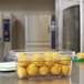 A Rubbermaid FreshWorks container holding lemons on a counter.