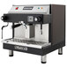 An Astra M1011 Mega Automatic Espresso Machine in black and silver with a stainless steel handle.