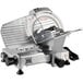 A silver Backyard Pro Butcher Series meat slicer with a circular blade.