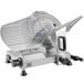 A Backyard Pro Butcher Series meat slicer with a clear cover over a metal blade.