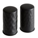 Two black American Metalcraft salt and pepper shakers with a hammered finish.