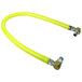 A yellow hose with two metal fittings and a nut.