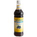 A Monin Sugar Free Blackberry Flavoring Syrup bottle filled with black liquid.