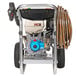 A Simpson gas powered pressure washer with a hose attached.