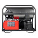 A Simpson Super Brute hot water pressure washer with a red and black tank.
