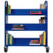A blue metal Hirsh Industries book cart with books on it.