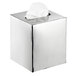 A polished stainless steel square tissue box cover with tissue paper in it.