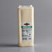 A rectangular white block of 6 lb. Part Skim Milk Mozzarella Cheese with a label.