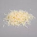 A pile of Shredded Asiago Cheese.