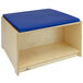 A Whitney Brothers wooden bench with a blue cushion.