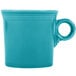 A turquoise Fiesta china mug with a handle.