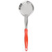 A Vollrath orange perforated round Spoodle with a metal handle.