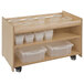 A wooden cart with white plastic containers on shelves.
