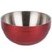A red and silver stainless steel Vollrath beehive serving bowl.