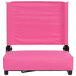 A pink rectangular chair with black handles and a backrest.