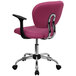 A pink office chair with black armrests and a chrome base.