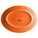 An orange oval Tuxton china platter.