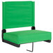 A Flash Furniture bright green stadium seat with a black base.