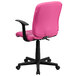 A Flash Furniture pink quilted vinyl office chair with arms and black wheels.