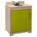 A Whitney Brothers electric lime wood kitchen set with a sink and cabinet with a green door.