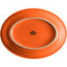 An orange oval Tuxton china platter with a white border.