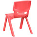 A red Flash Furniture plastic school chair with legs.
