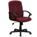 A burgundy office chair with black arms and legs.